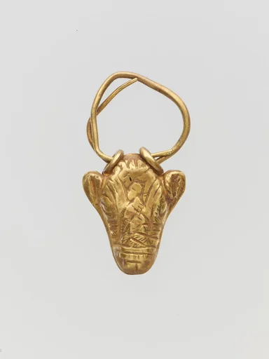Gold pendant in the form of a bull's head