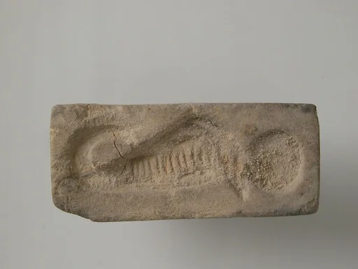 Stamp with uraeus and sun disk