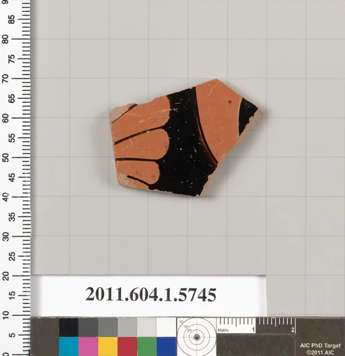 Terracotta fragment of a kylix: eye-cup (drinking cup)
