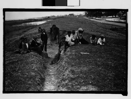 [Children on Levee, From Automobile, New Orleans Vicinity, Louisiana]
