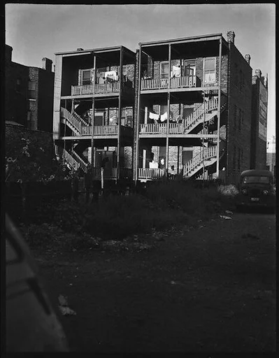[Rear View of Tenement Buildings and Street, Chicago, Illinois]