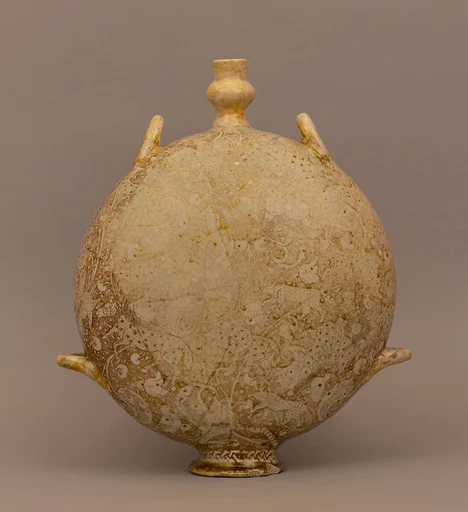 Flask with Harpies, Animals, and Human Figures in Lush Vegetation and a Pond