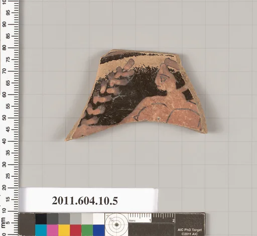 Terracotta fragment of a kylix (drinking cup)