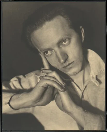 [Man with Head Resting on Hands]