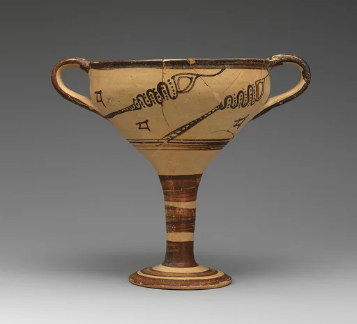Terracotta stemmed cup with murex decoration