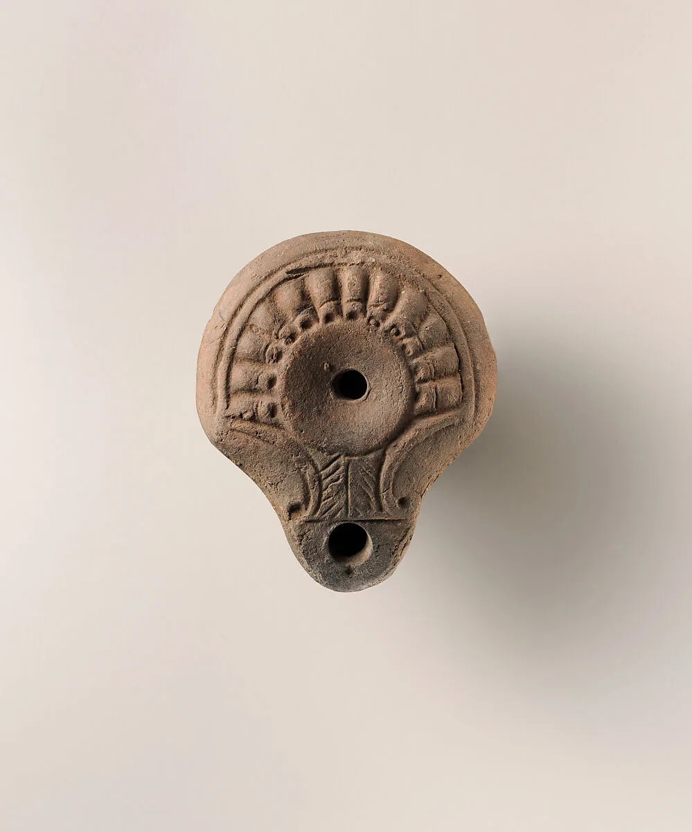 Terracotta oil lamp — Unknown
