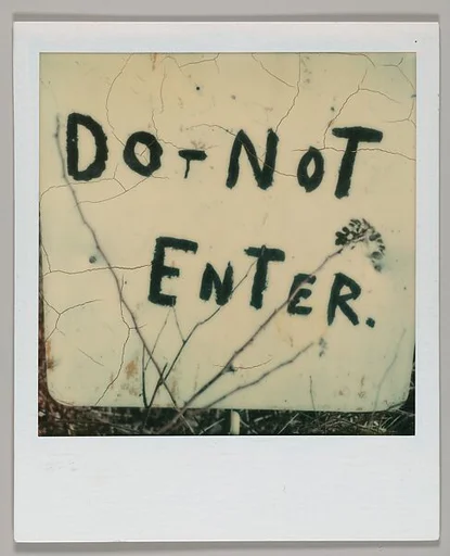 [Detail of Hand-Painted Sign: "DO NOT ENTER"]