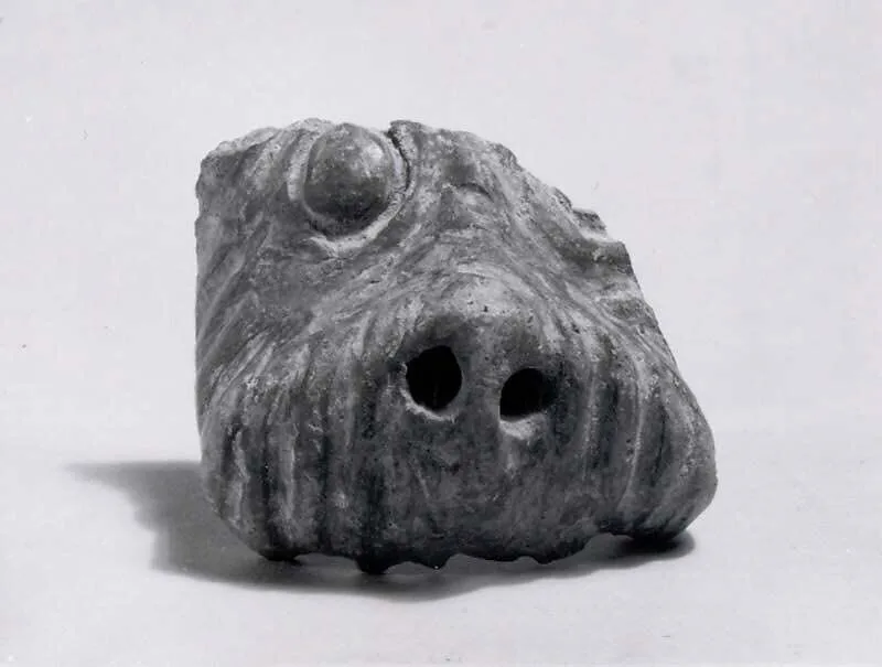 Lion figurine fragment — Unknown