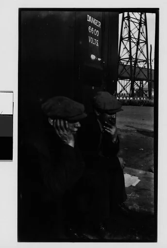 [Two Power Plant Workers? Seated on Stoop, New York City]
