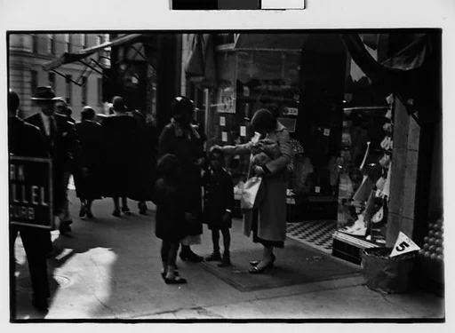 [Two 35mm Film Frames: Pedestrians on Sidewalk]
