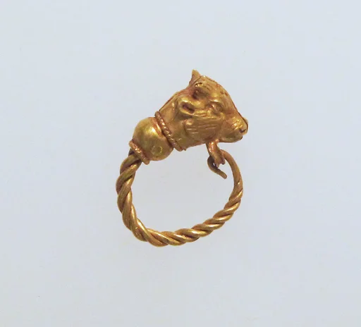 Gold earring with head of a bull