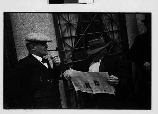 [Two 35mm Film Frames: Two Men on Street, Ossining, New York]