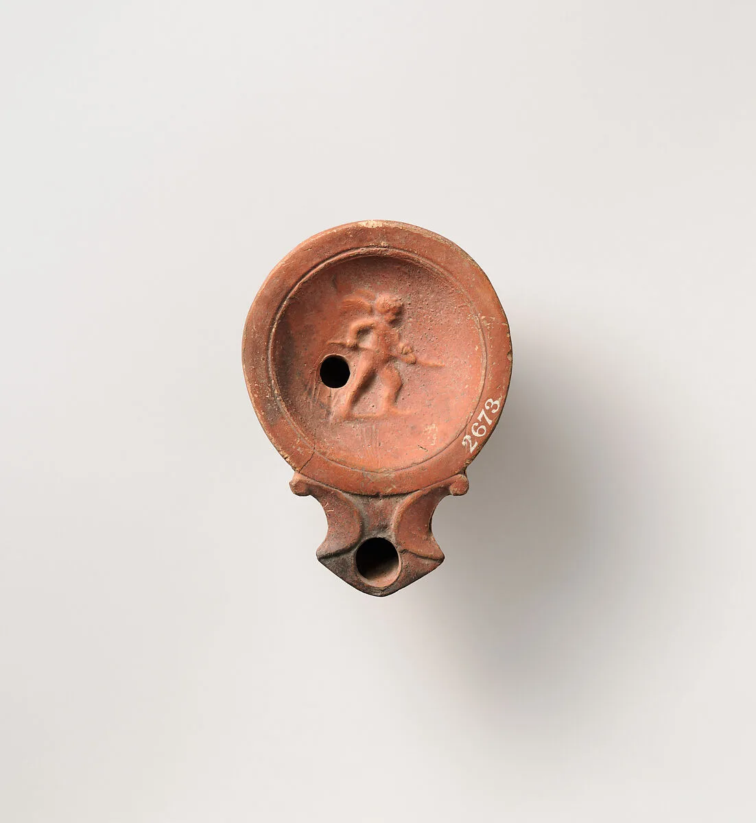 Terracotta oil lamp — Unknown