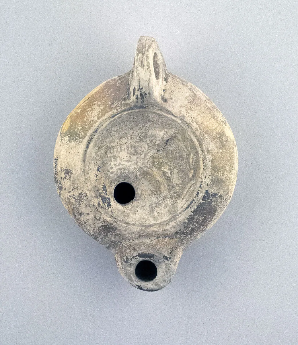 Terracotta oil lamp — Unknown
