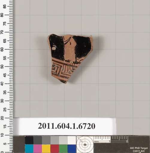 Terracotta fragment of a kylix (drinking cup)
