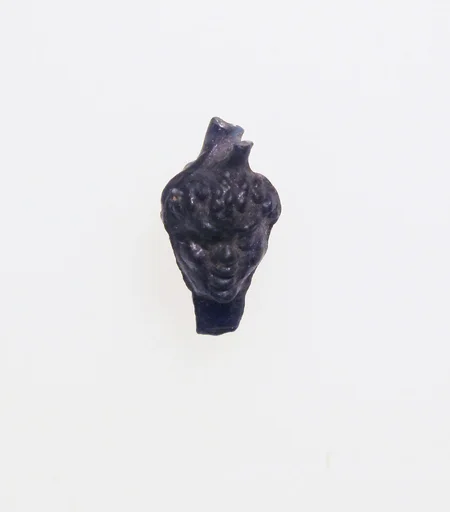Glass pendant in the shape of a Black African’s head