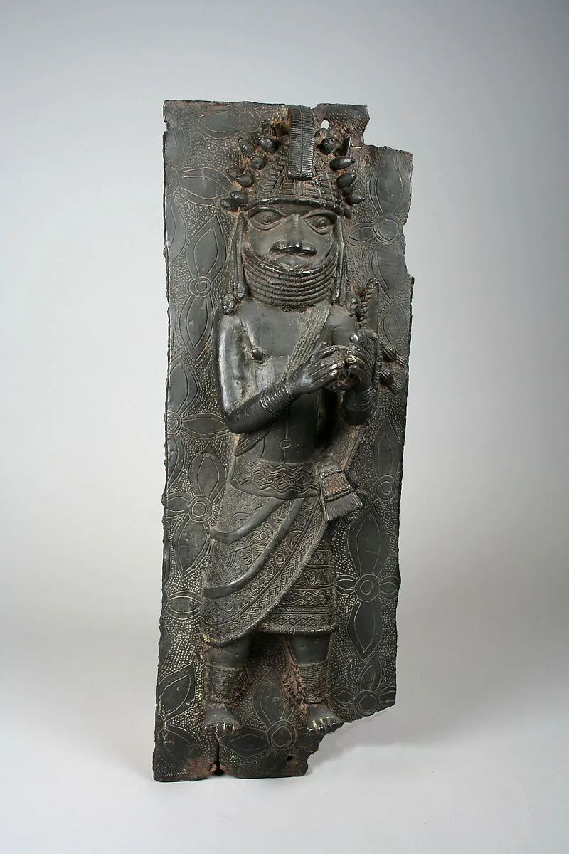Plaque: Titleholder with Calabash Rattle — Unknown
