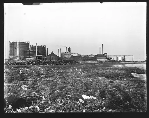 [Oil Refinery and Tanks]