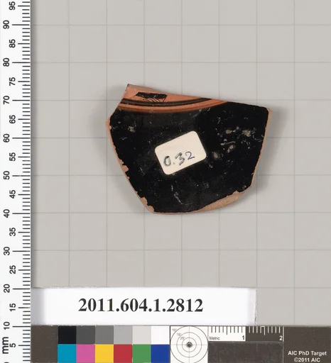 Terracotta fragment of a kylix (drinking cup)