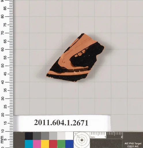 Terracotta fragment of a kylix (drinking cup)