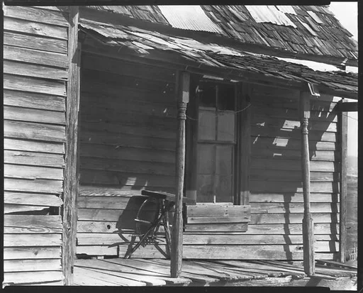 [Porch of Wooden House, Outskirts of Tupelo, Mississippi]