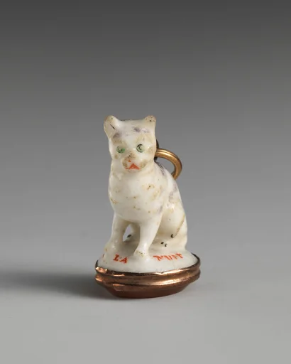 Miniature seal in the form of a cat