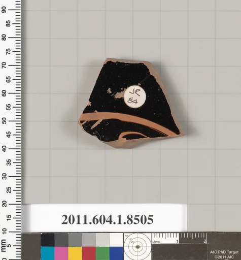 Terracotta fragment of a stemless kylix (drinking cup)