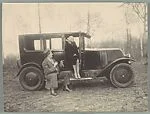 [John Gunther and Woman Seated on Sideboard of Car]
