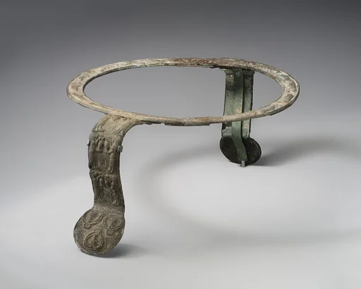 Bronze handles and rim of a cauldron