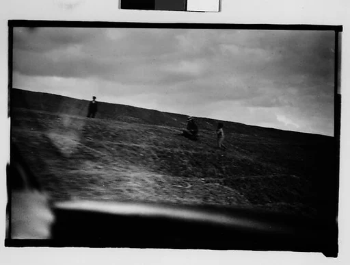 [People on Levee, From Moving Automobile, New Orleans Vicinity, Louisiana]