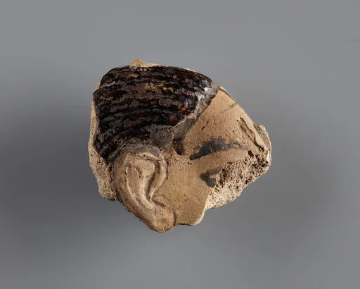 Tile with a fragment of a captive from the palace of Ramesses II