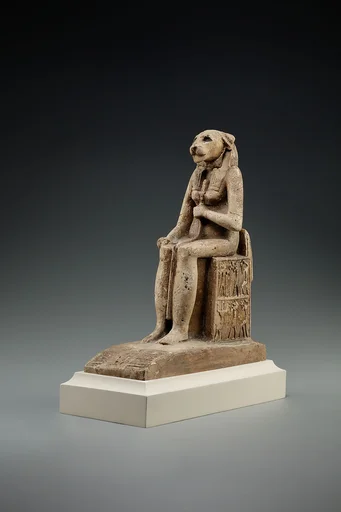 Bastet on a throne decorated with the decans