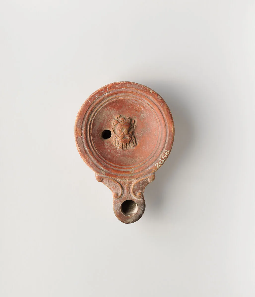 Terracotta oil lamp — Unknown