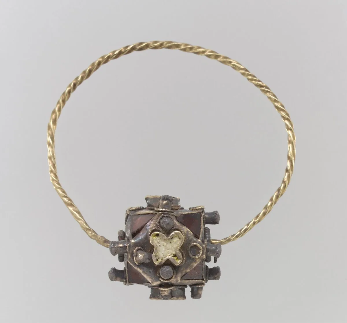 One of a Pair of Gold Earrings with Garnets — Unknown