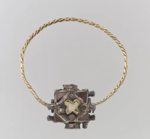 One of a Pair of Gold Earrings with Garnets