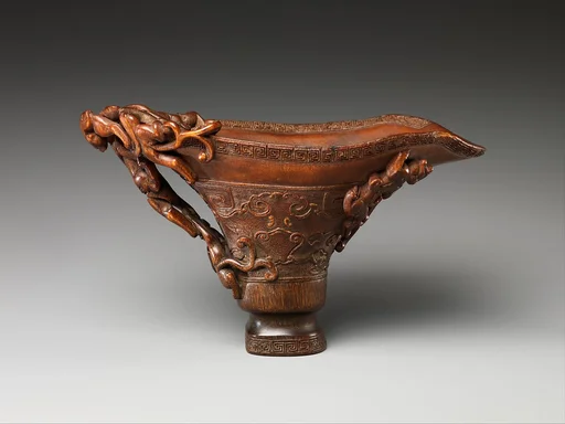 清早期  犀角雕螭龍杯|Cup in the shape of an archaic vessel with feline dragons