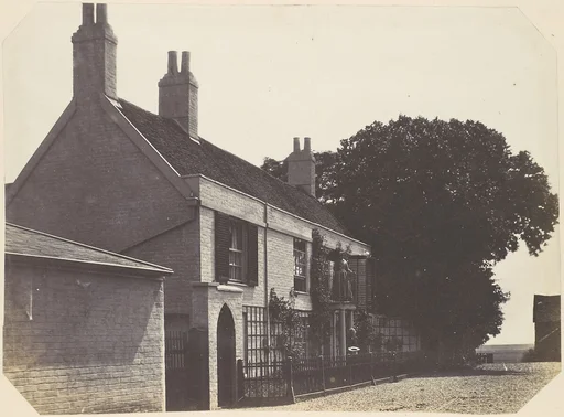 [House with Woman on Balcony, Man Standing Below]