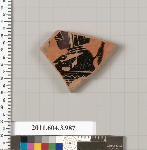 Terracotta fragment of a lekanis lid (covered dish)