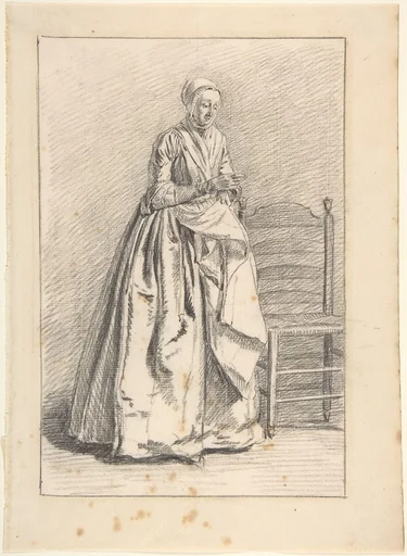 A Woman Standing next to a Chair