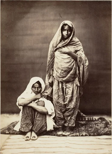 [Two Indian Women, One Seated]
