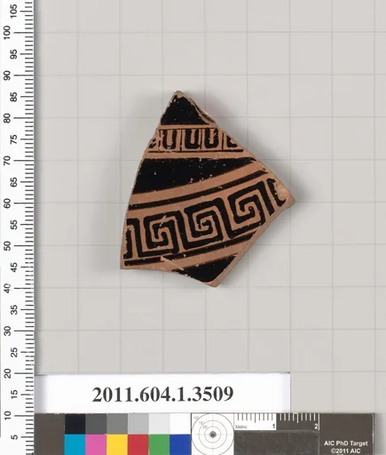 Terracotta fragment of a kylix (drinking cup)