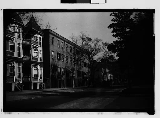 [View Down Street with Row of Folk Victorian and Italianate Houses, From Automobile, Savannah, Georgia]