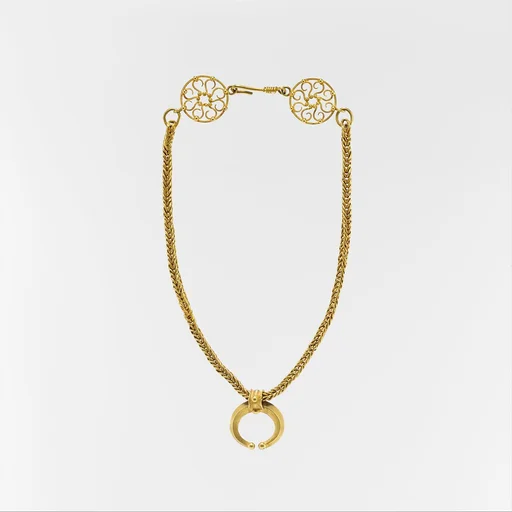 Gold necklace with crescent-shaped pendant