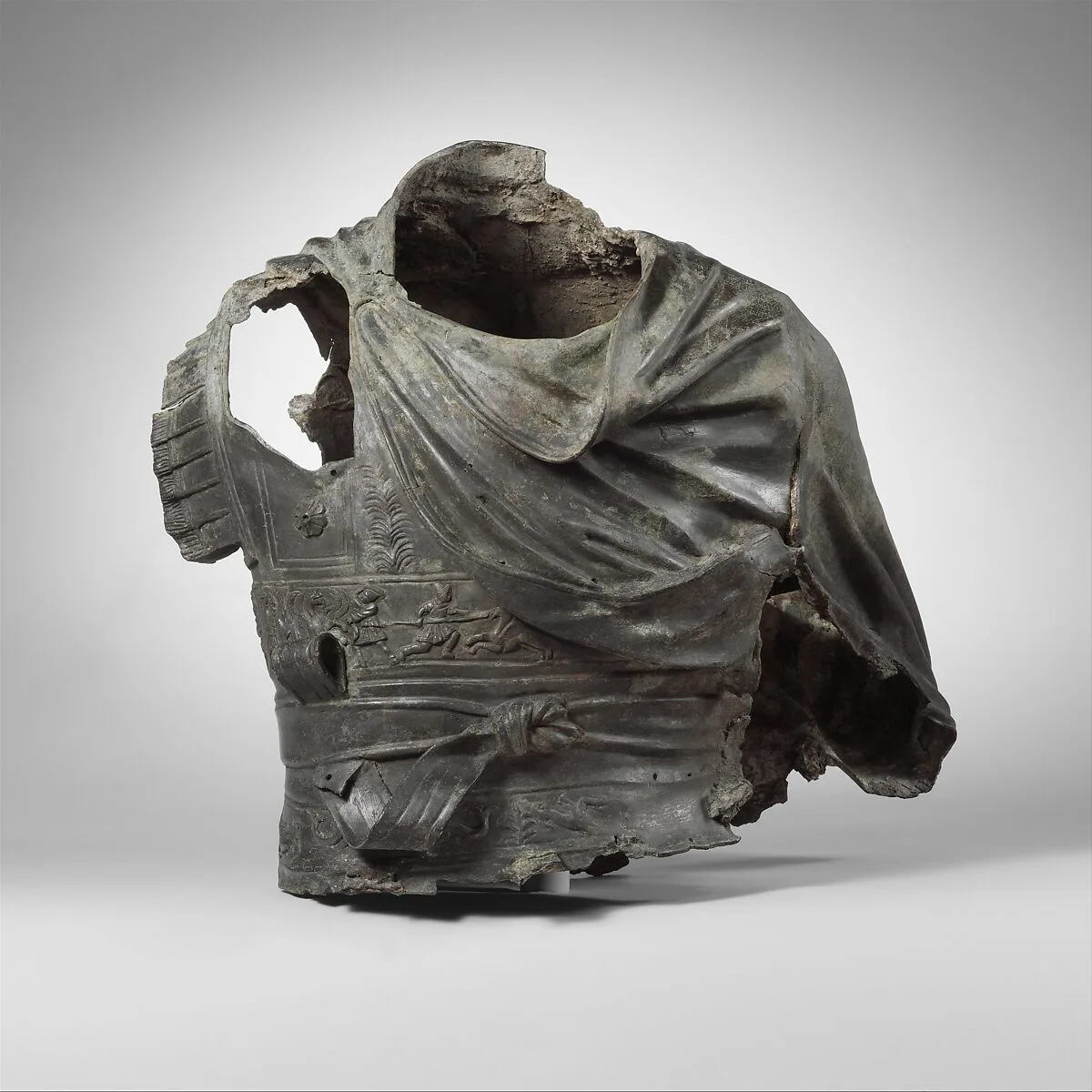 Bronze torso from an equestrian statue wearing a cuirass — Unknown
