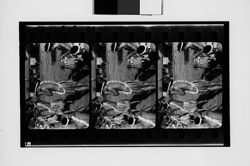 [South Seas: Three Motion Picture Film Frames of Dancing Group]