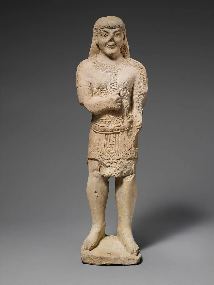 Limestone statuette of a beardless male votary in Egyptianizing dress — Unknown