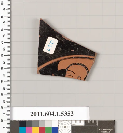 Terracotta fragment of a kylix (drinking cup)