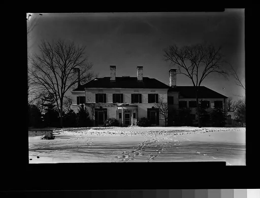 [Brick House with Circular Entry Porch]