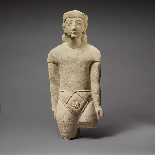 Limestone statuette of a male votary with Cypriot shorts and a diadem