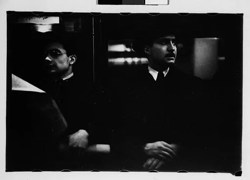 [Five 35mm Film Frames: Subway Passengers, New York City: Men, Woman with Packages, Man in Cap]